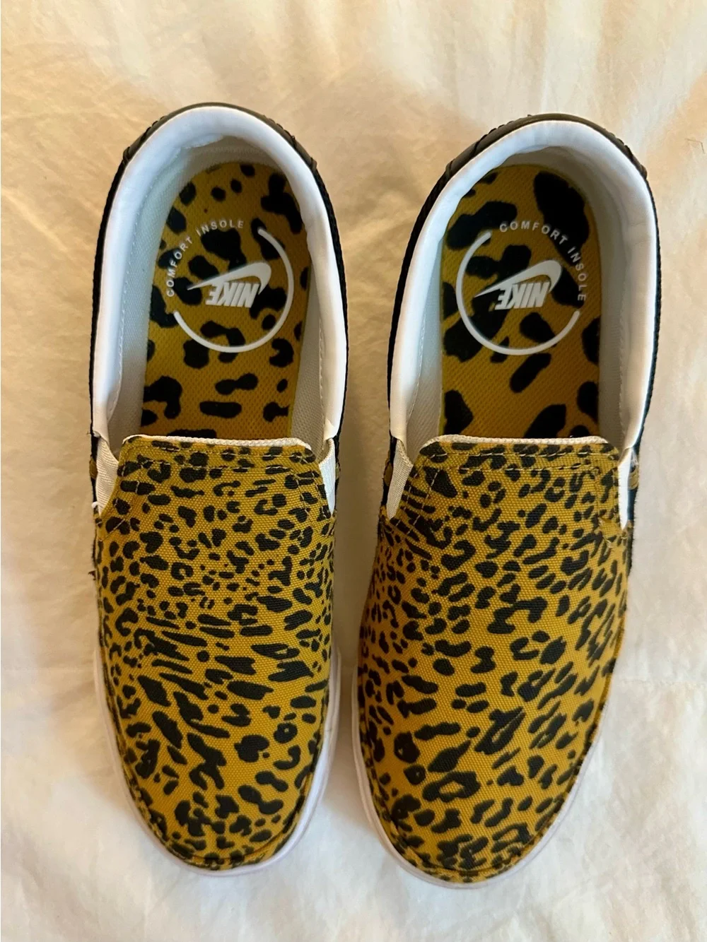 Nike Court Legacy Slip-On Sneakers in Yellow and Black Leopard Print